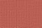 Scene curtain fabric background with metal weave. Rough woven red material with shiny inserts. Texture of coarse curtain fabric