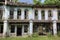 scene of the deserted and dilapidated colonial buildings.