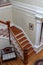 Scene of elaborate staircase and rooms inside The Van Horn Mansion, Burt, New York, 2018