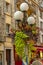 Scene on an evening with a nicely planted street lamp in a pedestrian street in Nice, France