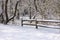 Scene with frosty fence after snow storm