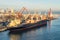 Scene with harbor cranes, elevators, ships and cargoes in Casablanca port, Morocco