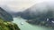 A scene on a rainy day of a cruise crossing the Geiranger Fjord, Norway