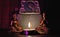 Scene: Two miniature Buddha statues, miniature altar and lighted candle,
