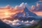 scene unfolds with captivating beauty as cloudy sunset mountain peaks poke out of the clouds