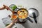 The scene of using a pressure cooker to make soup and cook dishes in the kitchen, marble countertop background