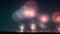 A Scene Of A Visually Rhythmic Fireworks Display In The Night Sky