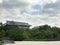 Scenery with ancient pagoda, trees and dramatic clouds at Changchun Wet Lands, China. Tranquil scenery with ancient pagoda, trees