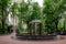 Scenery of a beautiful fountain in a lush green park in downtown Boston