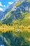 Scenery of couple canoeing on Bohinj Lake in Slovenia