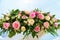 Scenery of flowers of white and pink roses on a wedding arch