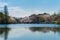 The scenery of the forest is reflected in the lake water in Inokashira Park