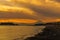 Scenery Kamakura Yuigahama Beach with Kamakura city and Fujisan mountain. Twilight silhouette Mount Fuji behind Enoshima island at