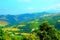 Scenery from Monte San Martino with ridges, ravines, thickets, buildings, roads, hills, trees