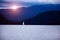 Scenery with sailboat on lake in sunrise light