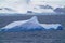 The scenery seen during the voyage. The iceberg is surrounded by the sea.