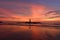 The scenery of the silhouette Khao Lak lighthouse in sunset time with the dramatic twilight sky at Phang-Nga, Thailand