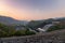 Scenery of Srinakarin dam with power plant in valley at morning