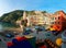 Scenery of Vernazza, a seaside village in Cinque Terre, Italy, with houses painted in bright colors