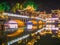 Scenery view of the bridge in the night of fenghuang old town .