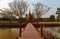 Scenery of Wat Sa Si, an ancient Buddhist Temple in Sukhothai Historical Park, with the majestic Pagoda Stupa in background