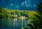 Scenery of white ancient castle in the autumn forest and wide lake in Hallstatt,Austria