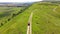 Scenic aerial panoramic view of idyllic rolling hills summer landscape