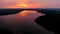 Scenic aerial sunset landscape of a lake of glacial origin. Bird's-eye view.