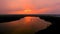 Scenic aerial sunset landscape of a lake of glacial origin. Bird's-eye view.
