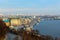 Scenic aerial view of Kyiv during sunrise. Ancient Podil Neighborhood with Dnipro River and embankment with River Port