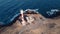 Scenic aerial view of a Lighthouse in volcanic coastline landscape. Tenerife, Canary Islands, Spain. Aerial 4K video