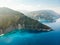 Scenic aerial view of picturesque jagged coastline of Kefalonia with clear turquoise waters, surrounded by steep cliffs