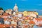 Scenic Alfama lookout with San Vicente Saint Vincent statue and Sao Vicente de Fora a church on the background