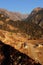 scenic alpine landscape and remote mountain village, snowcapped himalaya mountains in the background near tawang