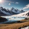 Scenic alpine view from sunlit green grassy hill to high snowy mountain range with sharp tops and glaciers under gray