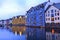 Scenic architectural view of Alesund skyline architecture at dusk