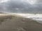 Scenic autumn sandy beach with waves and dunes in Sylt