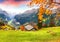 Scenic autumn view of picturesque alpine Wengen village and Lauterbrunnen Valley