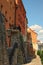 Scenic of the back of the residential houses in Loket. Their walls use medieval stone fortifications