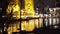 Scenic backdrop of city lights on Sacramento river and gold Tower Bridge