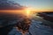 Scenic beach sunset, with majestic mountains as a breathtaking backdrop