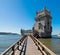Scenic Belem Tower and wooden bridge miroring with low tides on Tagus River. Torre de Belem is Unesco Heritage and icon of Lisbon