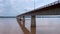 A scenic bridge crossing over a flowing river, capturing