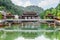 Scenic bridge reflected in water of the Tuojiang River, China