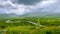 Scenic Brush Creek landscape surrounded with wildflower meadows in Colorado