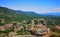 Scenic Bulgarian landscape with mountains and forests as seen from the Belogradchick Rocks, amazing view in the landmark rock