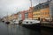 Scenic canal embankment with colorful houses, Copenhagen, Denmark