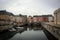 Scenic canal embankment with colorful houses, Copenhagen, Denmark