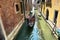 Scenic canal with gondola, gondolier, Venice, Italy