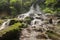 Scenic cascade Goa Giri Campuhan waterfall in tropical jungle in
